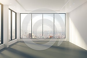 Modern empty room with windows in floor and city view