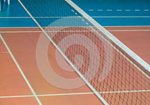 Modern empty school gym indoor with volleyball net