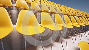 Modern empty yellow seats at stadium arena