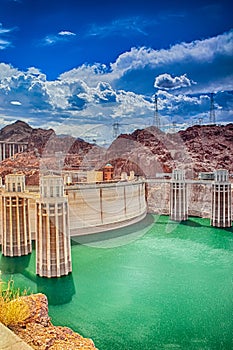 Modern Energetics Concepts. Hoover Dam and Penstock Towers in Lake Mead of the Colorado River on Border of Arizona and Nevada