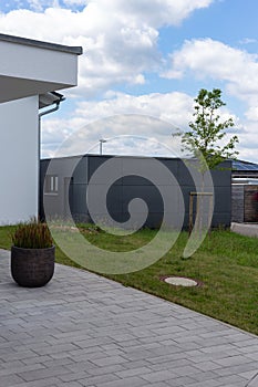 modern entrance area and garage in suburban street