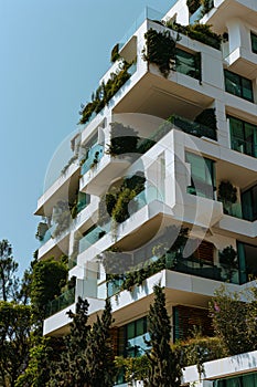 modern Environmentally friendly apartment block with greenery