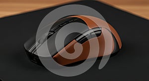 Ergonomic computer mouse with brown leather accents on black mousepad