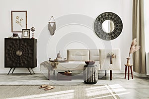 Modern ethnic living room interior with design chaise lounge, round mirror, furniture, carpet, decoration, stool and elegant.