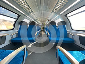 Modern european economy class fast train interior.