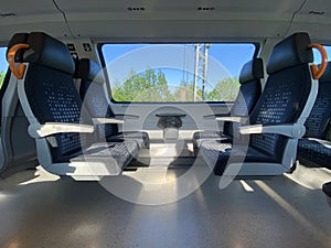 Modern european economy class fast train interior.