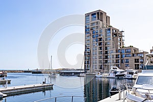 Modern and expensive area in Copenhagen with new luxury houses and a pier for yachts.