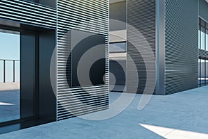 Modern exterior with black billboard mockup, ideal for urban advertising against a striped background.