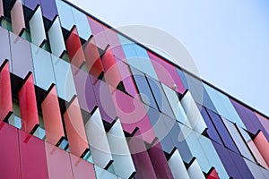 Modern exterior of a colorful office building in Milan, Italy