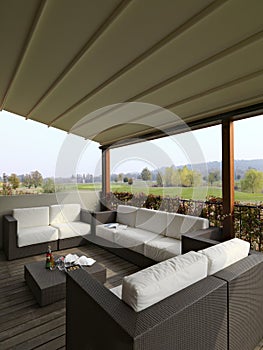 Modern fabric sofas and wicker in the  porch