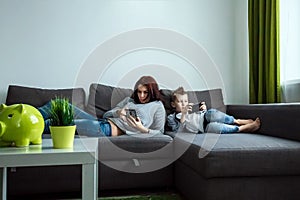 Modern family, everyone is sitting in smartphones than the passionate. The concept of harmfulness of modern gadgets, the