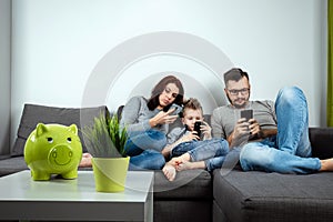 Modern family, everyone is sitting in smartphones than the passionate. The concept of harmfulness of modern gadgets, the