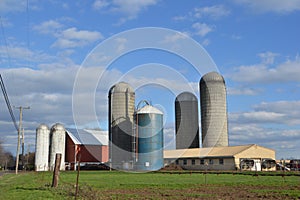 Farm with silos and grain driers photo