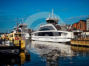 modern ferry arrive to a city quayside. Oslo urban dock, Norway