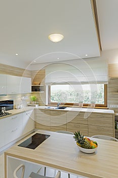 Modern fitted kitchen with window