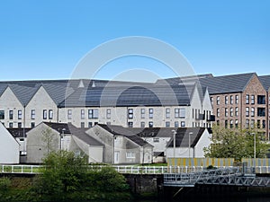 Modern flats built next to old council houses in Govan by the River Clyde photo