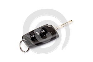 Modern folding car key isolated on white background photo