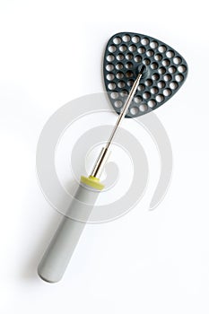 Modern folding potato masher on white background