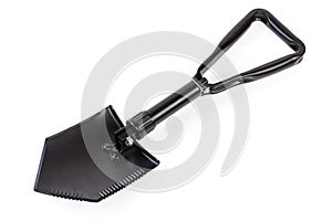 Modern folding steel entrenching tool on a white background