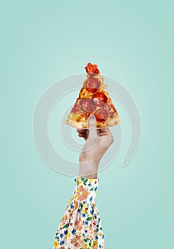 Modern food poster. Woman holding a piece of salami pepperoni pizza. Modern food concept. Advertising, marketing and business.