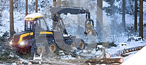 modern forestry machine in a winter forest