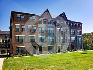 modern four-story brick townhouse