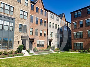 modern four-story brick townhouse