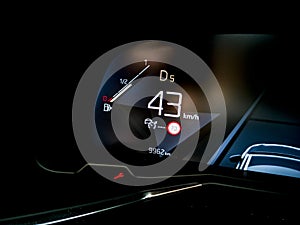 Modern fuel gauge in car dashboard