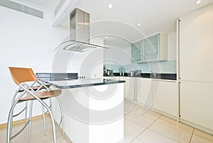 Modern fully fitted kitchen in vanilla white