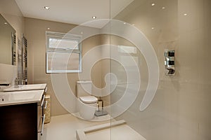 Modern fully tiled luxury shower room