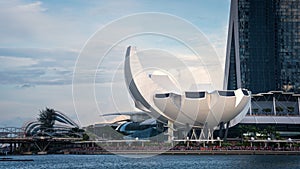 Modern, futuristic building located near a river: Marina Bay Sands, Singapore