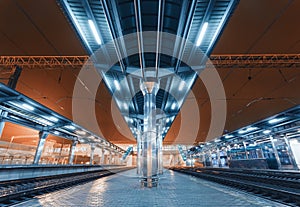 Modern futuristic railway station with illumination