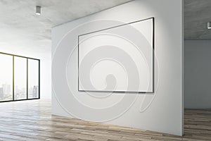 Modern gallery interior with mock up frame on white concrete wall, wooden flooring and window with city view. Museum or apartment
