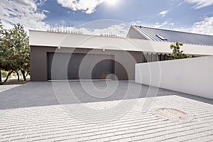 Modern garage with big driveway