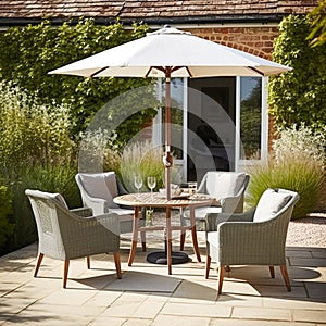 Modern garden lounge, outdoor furniture and countryside house patio decor with sofa, sun lounger, sunbed and umbrella