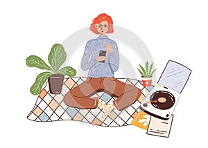 Modern girl, woman in comfy, hygge homewear chatting, listen music records on turntable at home. Online communication