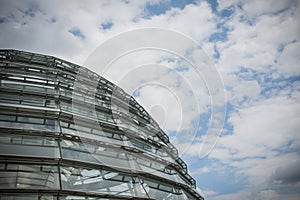 Modern Glass architecture and cloudy sky