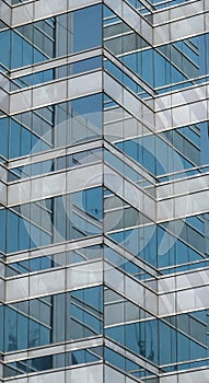 Modern glass building with reflections