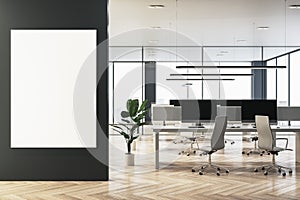 Modern glass coworking office interior with empty white mock up banner on wall, wooden flooring, panoramic windows and city view,