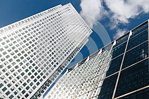 Modern glass exterior of corporate office buildings shot from a