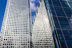 Modern glass exterior of corporate office buildings shot from a