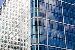 Modern glass exterior of corporate office buildings shot from a