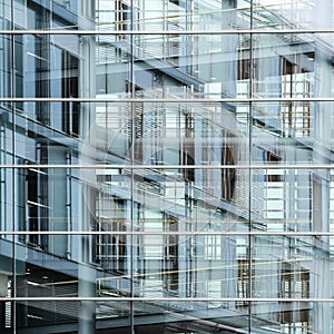 modern glass facade with reflection, background texture for international business in a big city