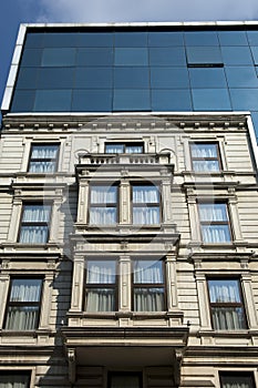 modern glass facades on a house in classic style