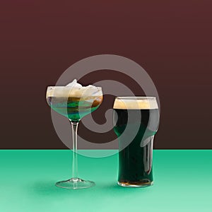 A modern glass Irish coffee with milk foam and pint of black stout beer glass and modern glass of . Minimal pub concept. Plum