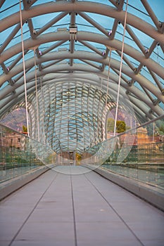 a modern glass peace bridge in georgia