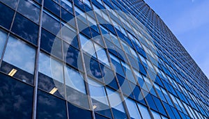 Modern glass skyscraper facade perspective view