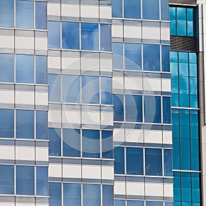 Modern glass-walled highriser building facade