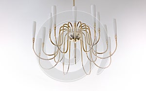 Modern gold Chandelier on a ceil in living room interior.