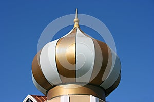 Modern gold dome with white stripes